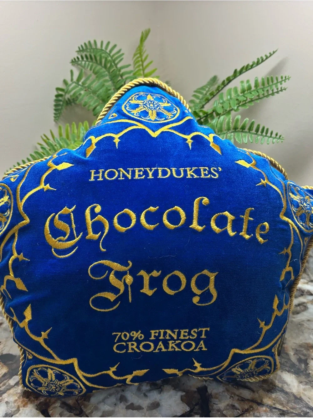 Honeydukes® Chocolate Frog Accent Pillow - with zipper frog inside